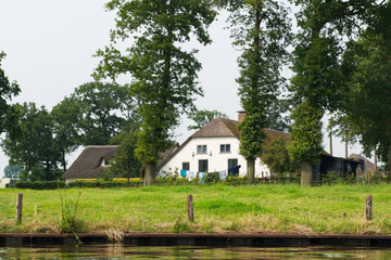 Dutch farmhouse near river