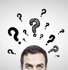 man with questions symbol