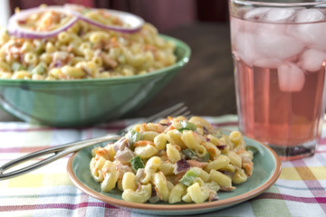 A serving of traditional macaroni salad with lemonade