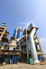 Fototapeta na wymiar giant mechanical facilities in a cement factory