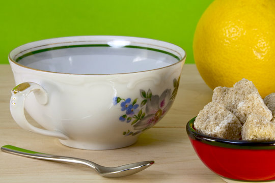 Teacup, lemon and brown sugar