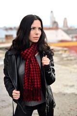 Obraz premium Sexy girl over city background