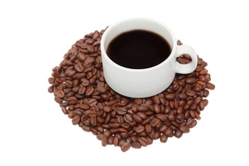isolated cup of coffee with coffee beans