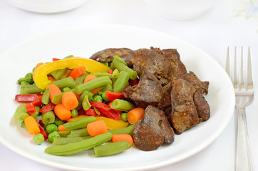 Boiled vegetables with chicken liver