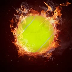 Photo sur Plexiglas Sports de balle Balle de tennis chaude dans la flamme des feux
