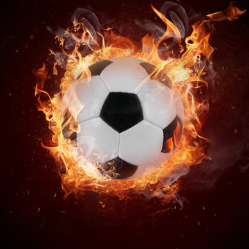 Hot soccer ball in fires flame