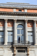 Fototapeta na wymiar Window with balcony - fragment of building of Prado Museum