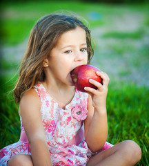 girl eating an apple