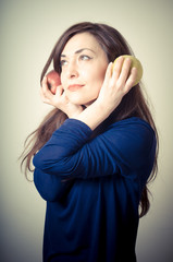 beautiful woman with red and yellow apples