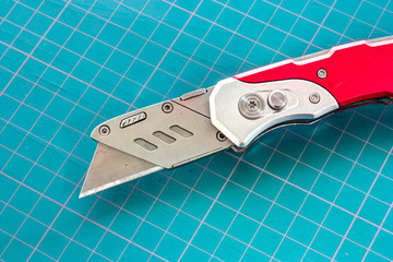 Close up of cutter and cutting mat