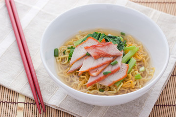 Noodles and meatball with chopsticks , asian noodle