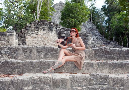 tourist against pyramid Mexico.Archeologic zone Kabah.