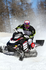 snowmobile in action
