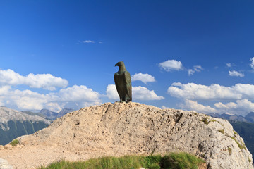 bronze eagle in Dolomites