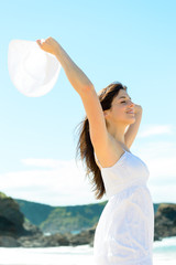 Happy woman on summer beach in Spain