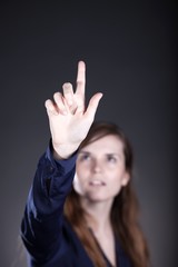 Woman's hand, one finger pointing something