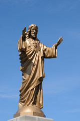 Quebec, a statue of Jesus in the village of Baie des sables
