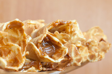 Macro of homemade wafer cones with cream