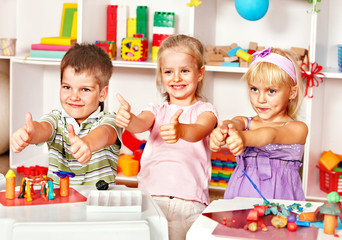 Children sculpt in of plasticine