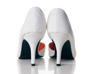 pair of white women's shoes