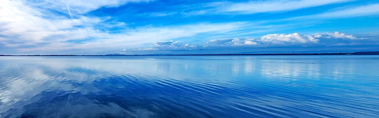 Fotobehang Zonsondergang blauw panoramisch landschap. Lagune, Argentario, Italië. © stevanzz