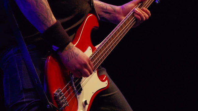 Bass guitar player on stage
