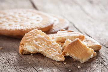 Crushed biscuit on wooden table