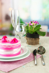 Romantic table serving on bright background