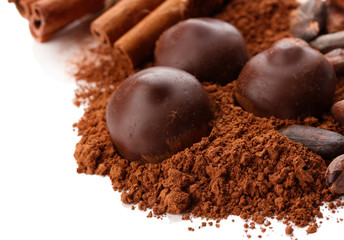 Composition of chocolate sweets, cocoa and spices, isolated