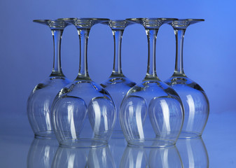 Glasses on blue background