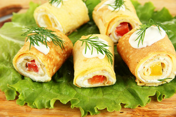 Egg rolls with cheese cream and paprika,