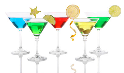 Alcoholic cocktails in martini glasses isolated on white