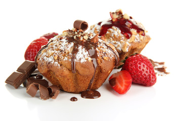 Tasty muffin cakes with strawberries and chocolate, isolated
