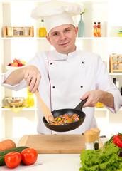 Chef cooking in kitchen