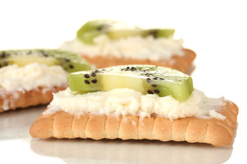 Cookies with milk cheese and kiwi, isolated on white