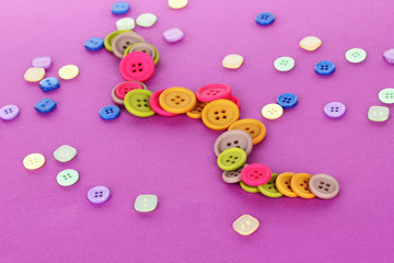 Bright color buttons on a purple background