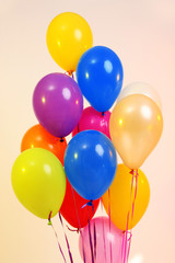 Many bright balloons close-up