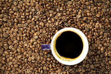 Hot coffee with coffee beans