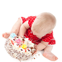 Baby girl and her birthday cake.