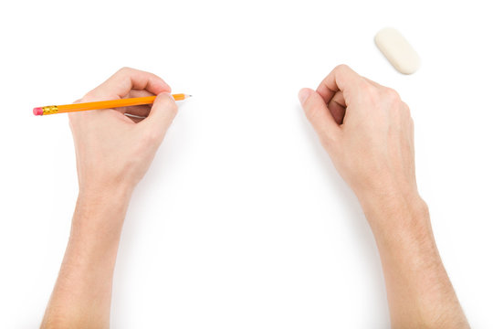 Left-hander with pencil writing something