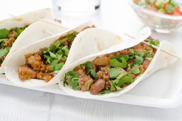 chili con carne in wheat tortillas