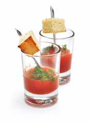 ketchup in ramekin on white background