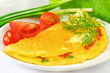 Omelet with herbs and vegetables