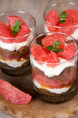 Sweet dessert tiramisu with fresh grapefruit
