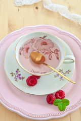 Raspberry tea in vintage cup