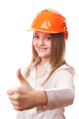 Teenager girl in a hardhat, isolated on a white background