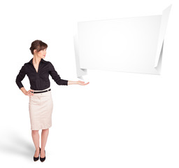 young woman presenting abstract origami copy space
