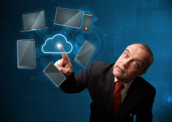 Businessman touching high technology cloud service