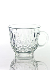Empty glass cup isolated on white background