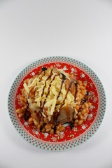 baked potato with cheese and baked beans with balsamic drizzle